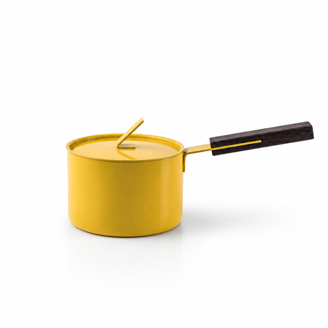 Aluminium Saucepan Designed by Lara Caffi for the Beyond Basic series, this functional item bridges industrial efficiency with material consistency, bringing a vibrant ochre yellow accent and a cheerful atmosphere into everyday culinary preparation.