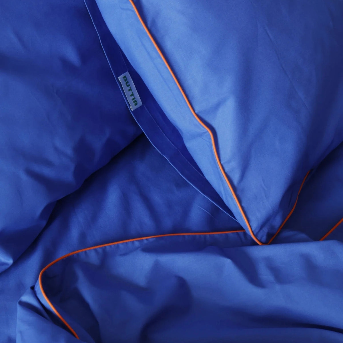 BUTTIA BORDERLINE Combo 03 Navy on Green washed cotton duvet cover with contrast piping crafted in Kyiv Ukraine