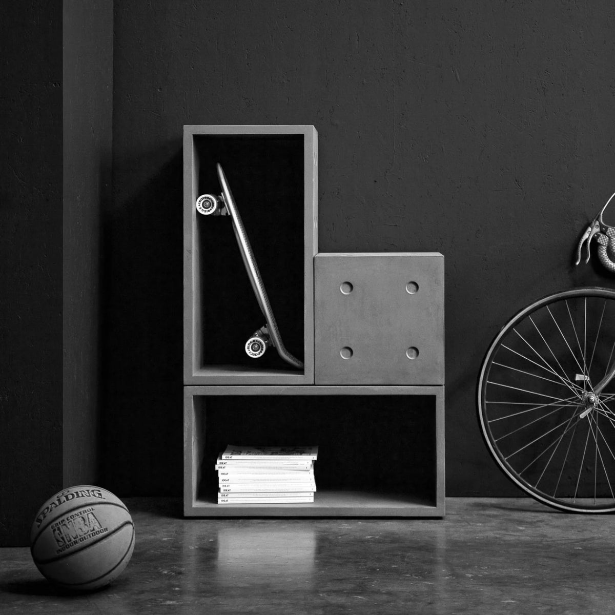 Modular concrete storage Dice Configuration 1 in Industrial Brutalism style, handcrafted in Lyon, France.