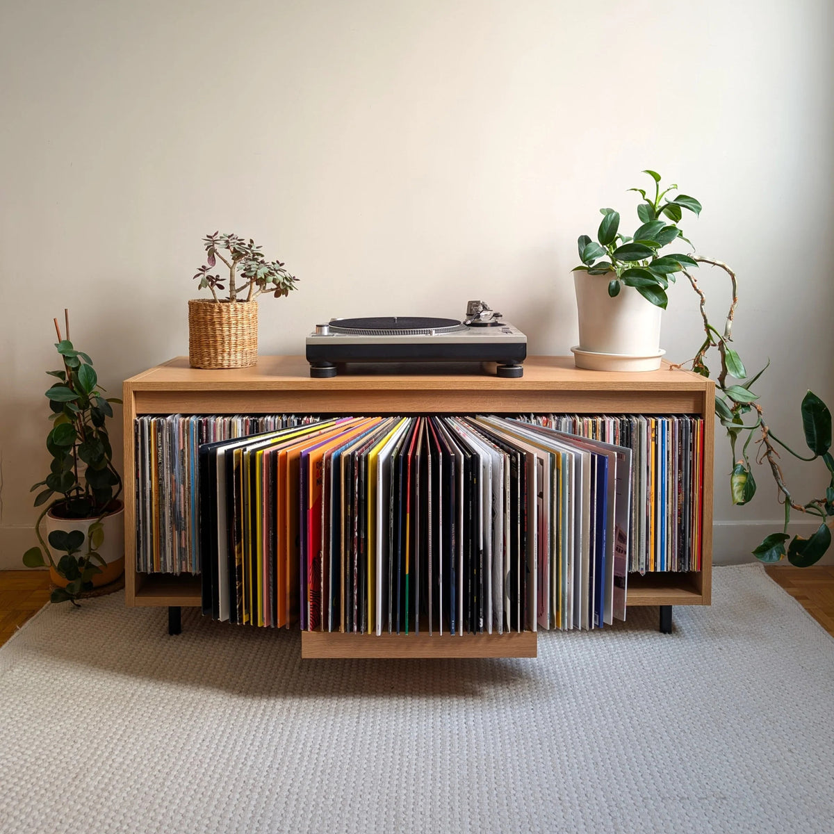 Mid-century modern stackable Groovaly Bloom vinyl storage console in oak and walnut made in Latvia
