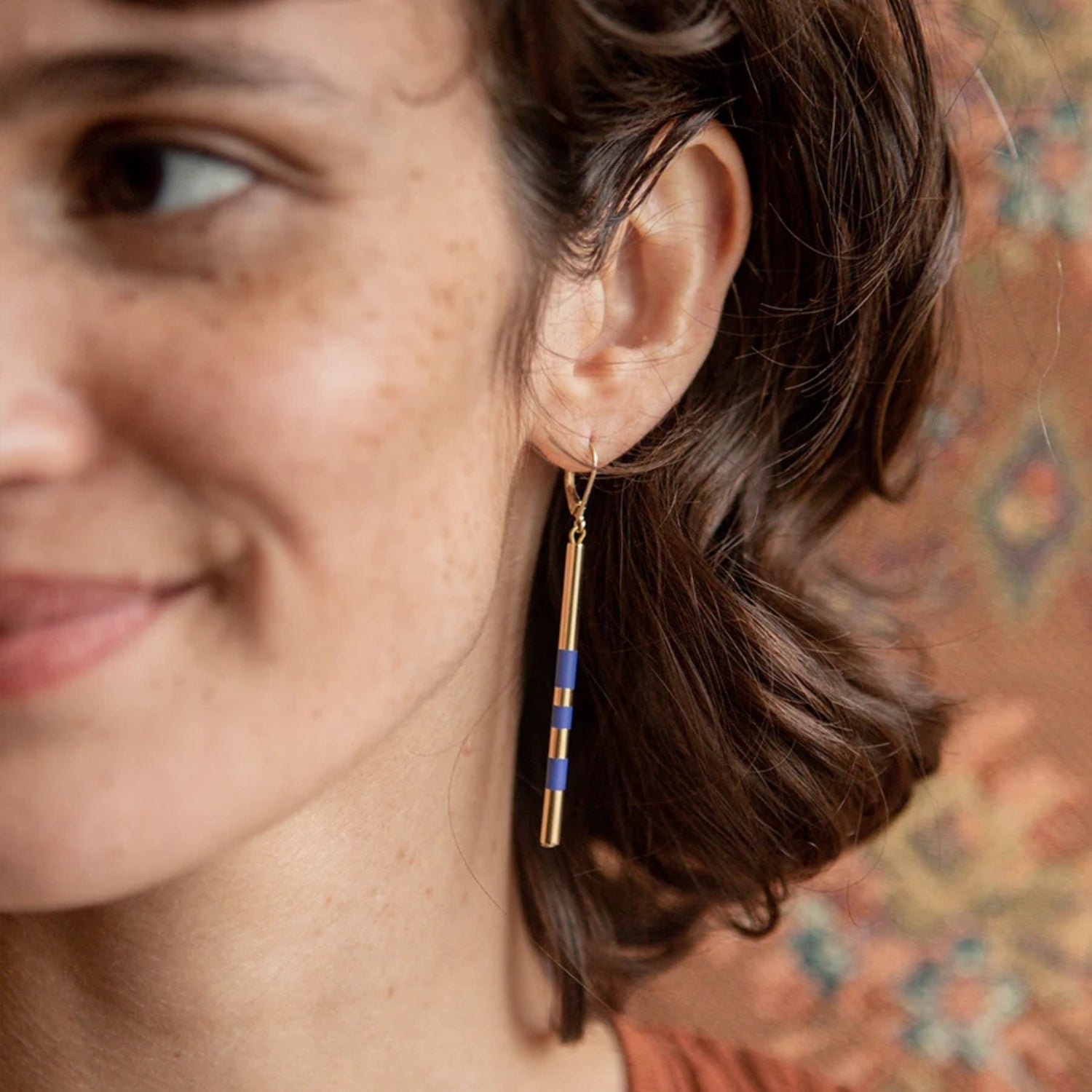 Judith Benita Savoy asymmetrical graphic earrings in 24-karat recycled gold-gilded brass and electric blue lacquer handmade in Paris