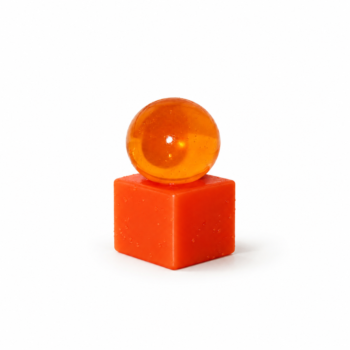 Matias Moellenbach OBA Papaya soap with translucent orange sphere on a coral resin base. Gifting idea