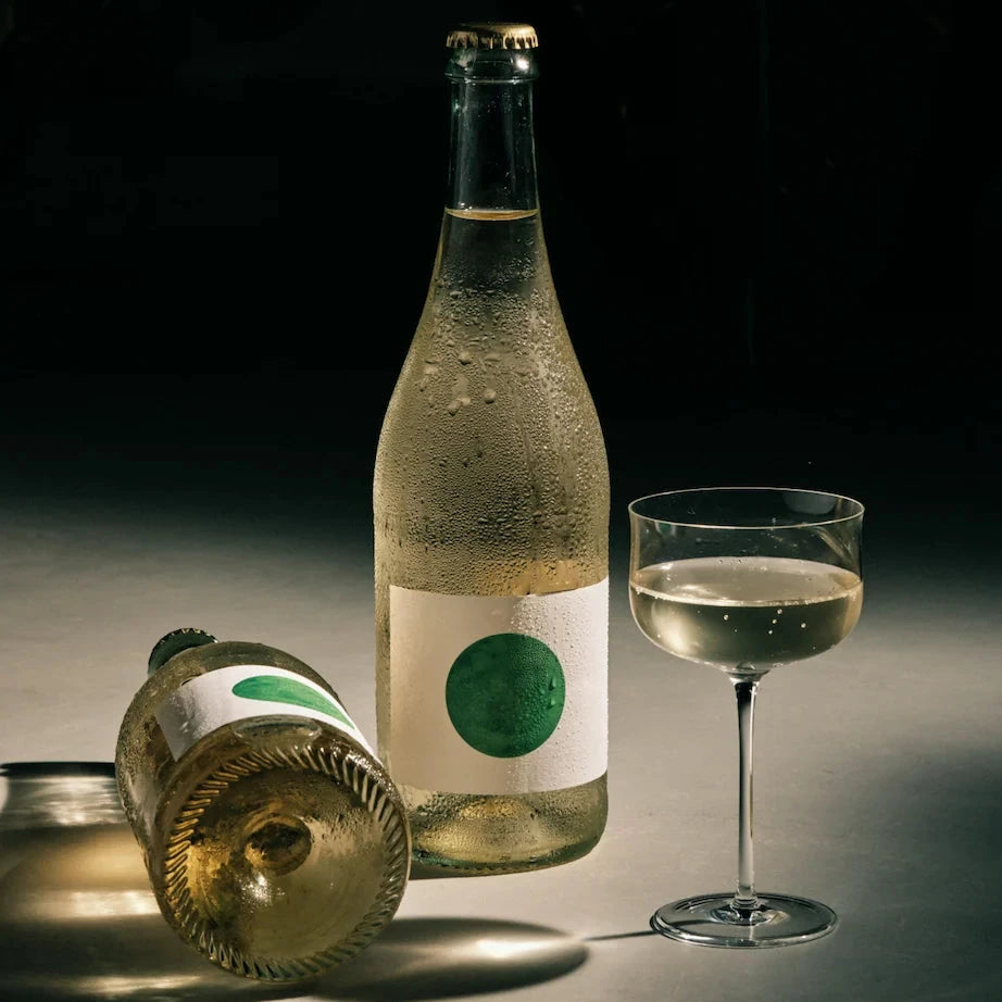 A 75cl bottle of Rish Wild Fig Leaves kombucha. An organic, non-alcoholic botanical drink with wild fig leaves and Sencha green tea.