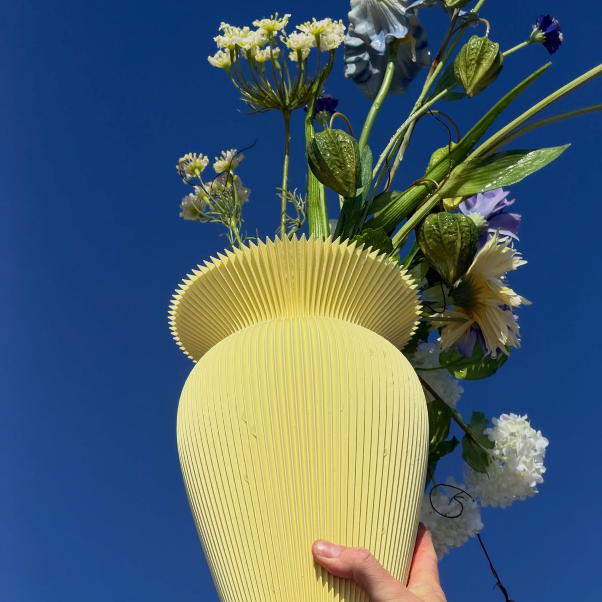 Sustainable 3D-printed recycled material vases and lamps by Studio Branches from Sweden