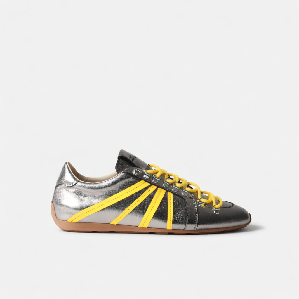 Claudie Pierlot Swing silver trainers in metallic cow leather with technical hiking details handmade in Portugal Dear Johny. Architectural sneaker with a silver finish produced in European workshops.