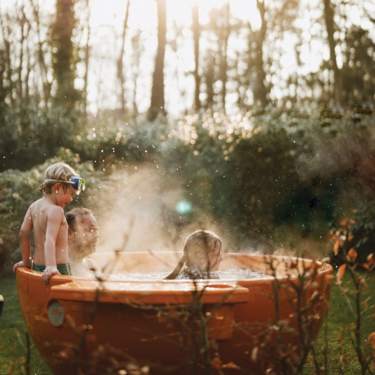 Weltevree Dutchtub Original orange iconic wood fired four person outdoor hottub pool designed by Floris Schoonderbeek Amersfoort Netherlands design studio Dear Johny