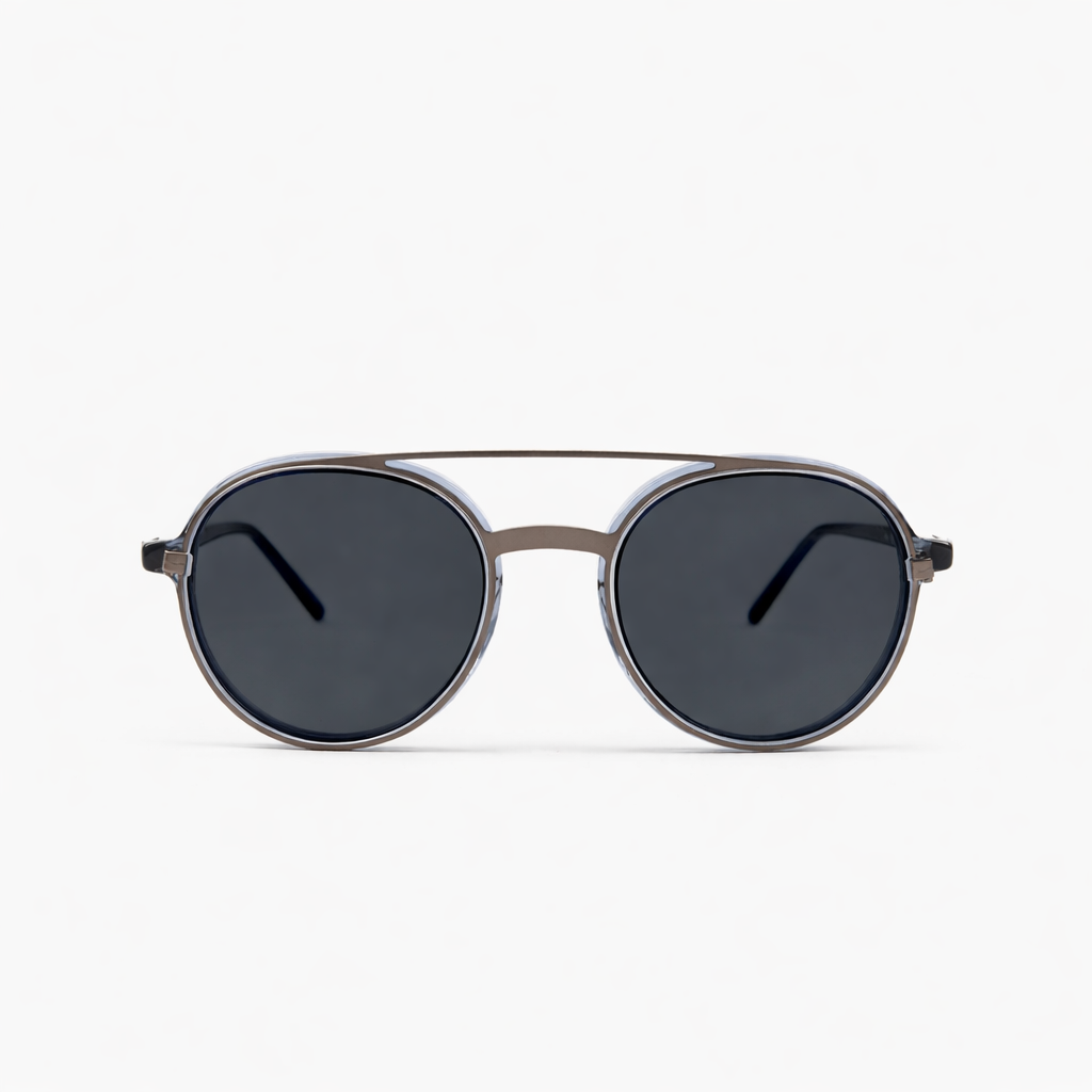 Wolfin Eyewear Andy Transparent Blue Sunglasses with gunmetal details. Premium acetate frames with ergonomic bridge and tinted lenses. Timeless Belgian design style, made in Italy.