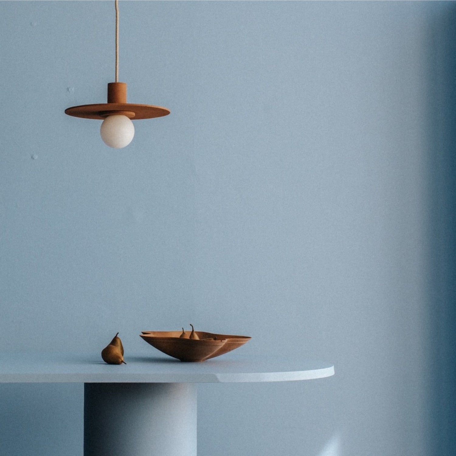 Handmade concrete lighting, architectural hardware, and minimalist decor objects by Zuri