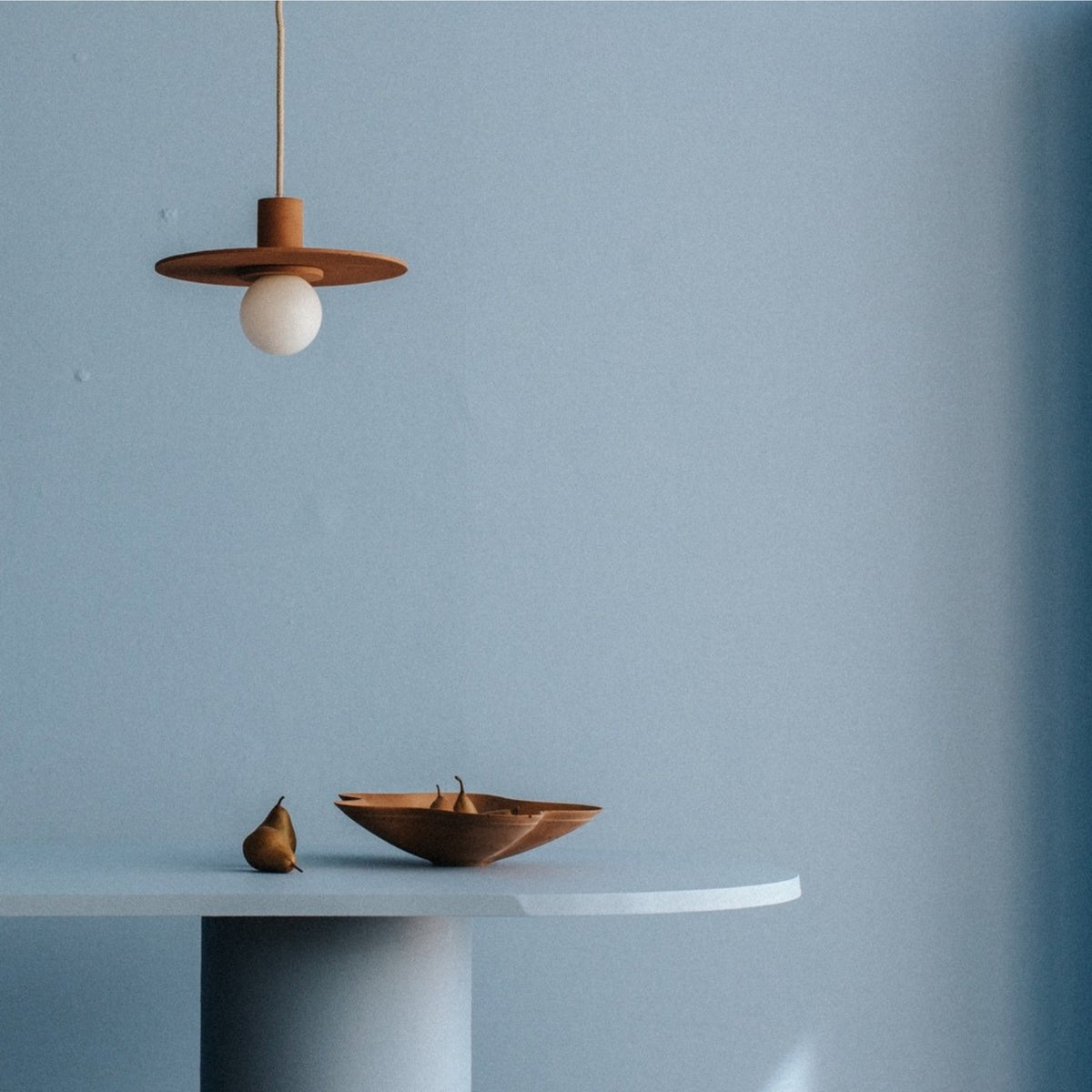 Handmade concrete lighting, architectural hardware, and minimalist decor objects by Zuri
